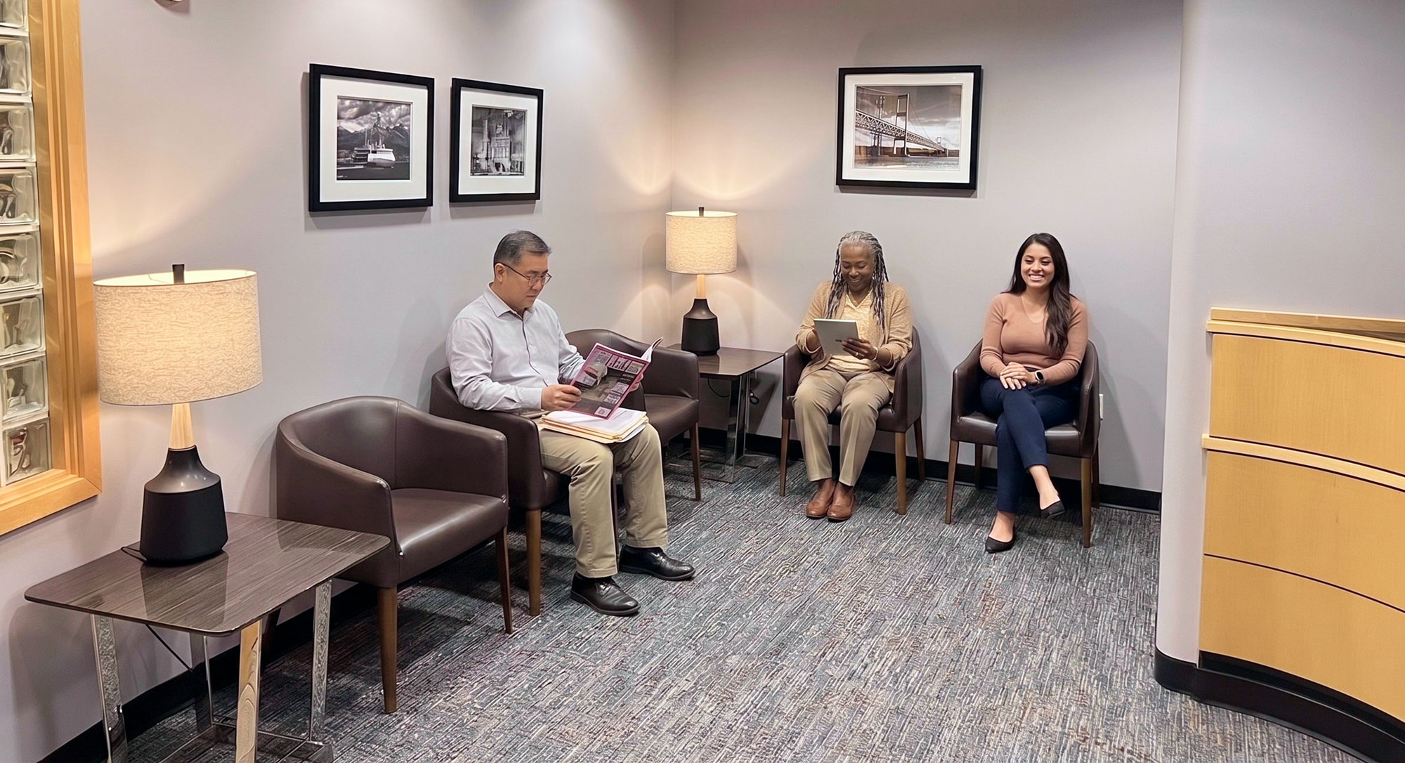 Patients relaxing in the Dentistry NW waiting room